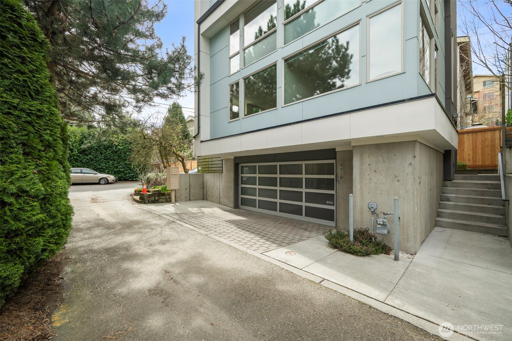 1810 23rd Avenue, Unit A Seattle, WA 98122 - Photo 3 of 26 a view of a house with a garage