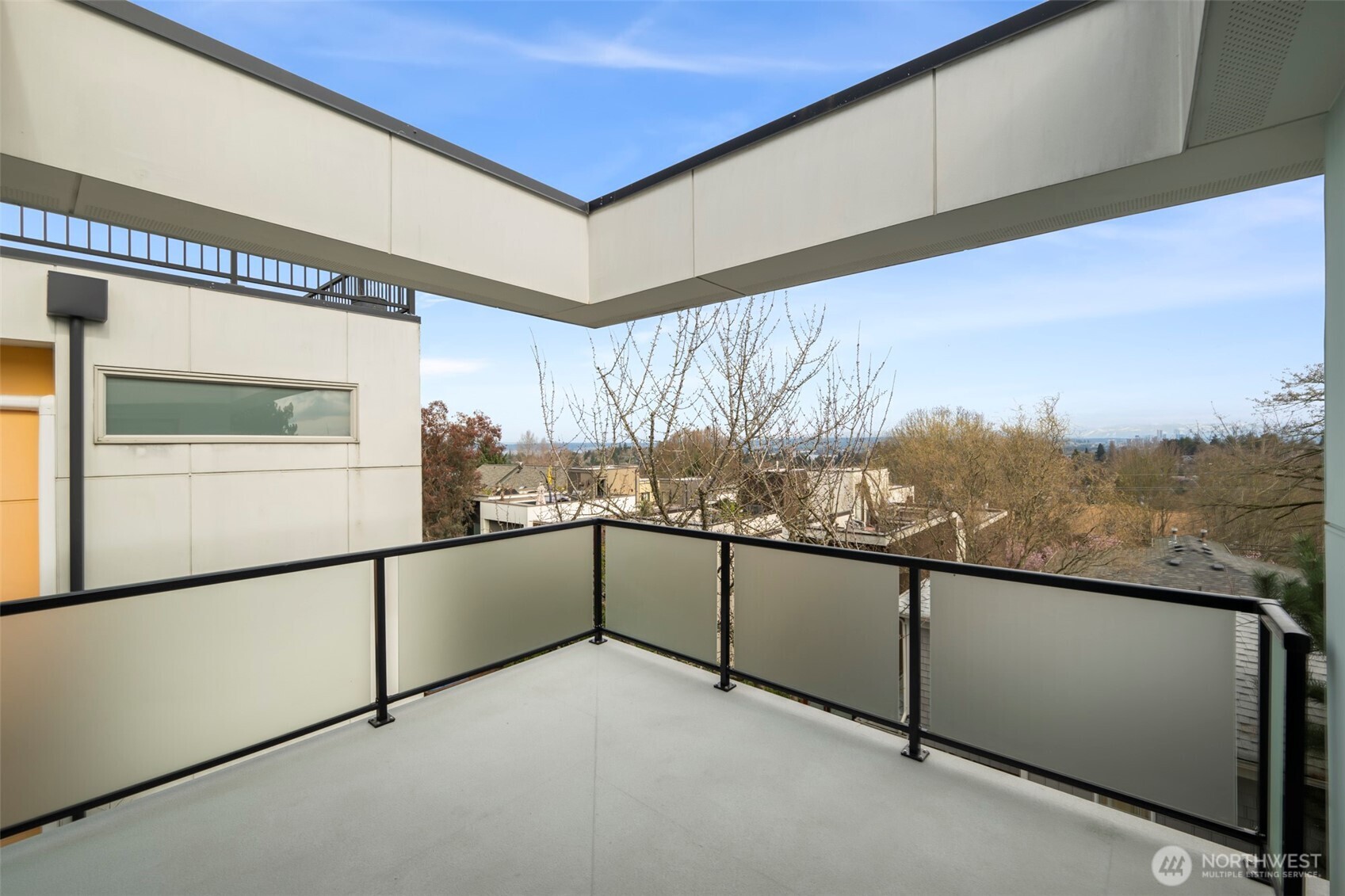 1810 23rd Avenue, Unit A Seattle, WA 98122 - Photo 7 of 26 a view of a building from a balcony