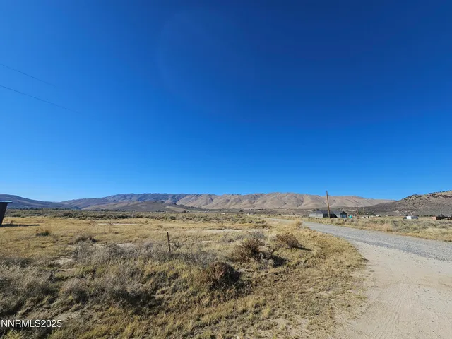 a view of mountains and valleys