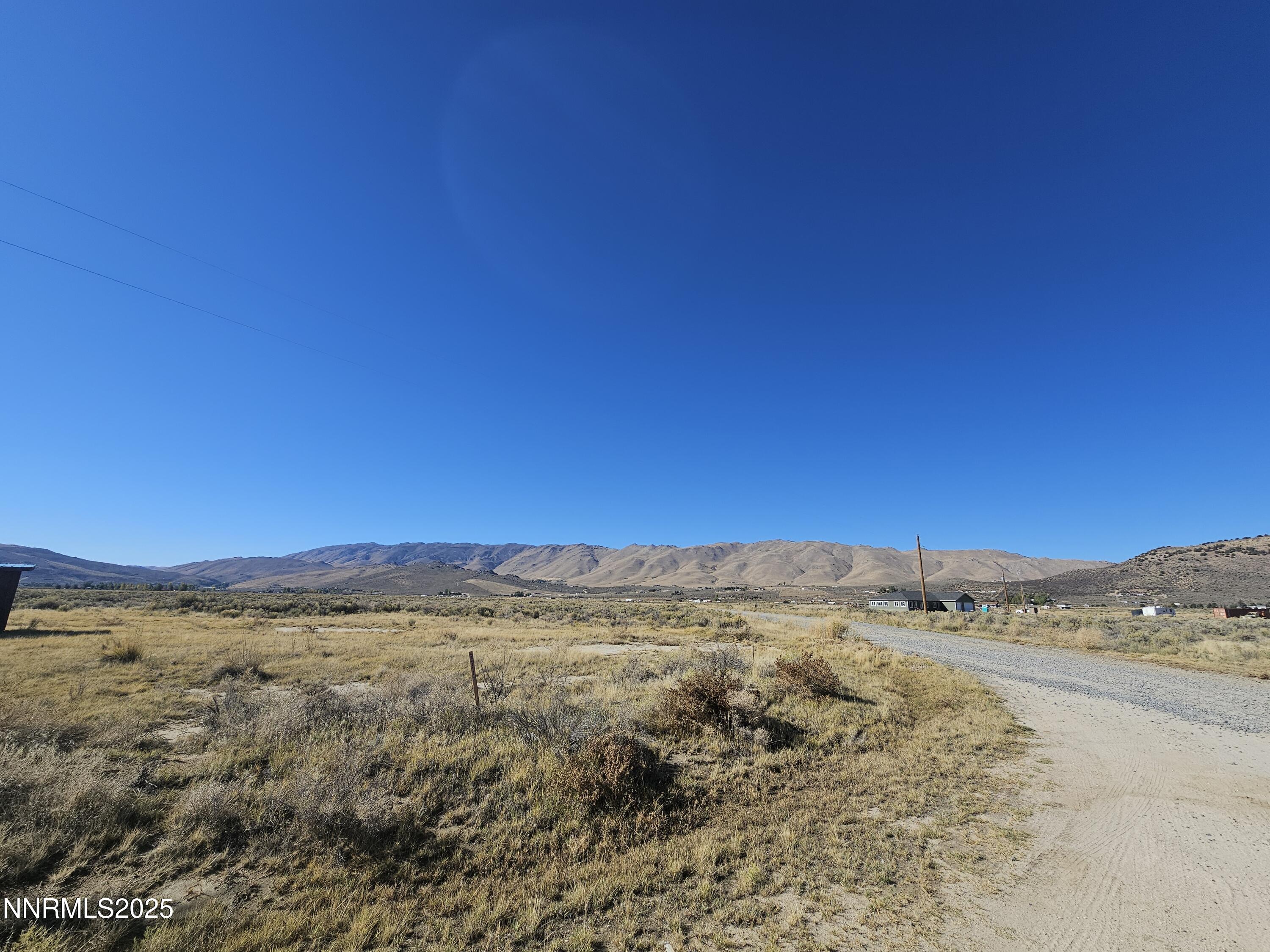 a view of mountains and valleys