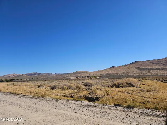 a view of mountain view with mountains in the background