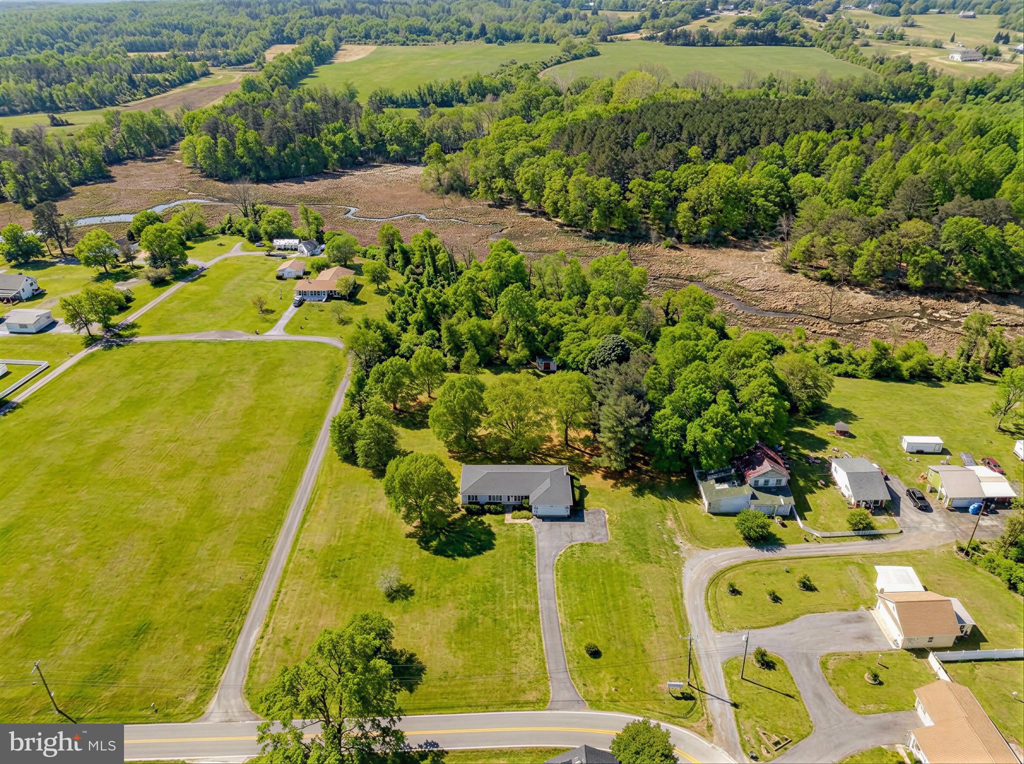 7615 Mill Creek Road Benedict, MD 20612 - Photo 2 of 37 a view of a garden with plants
