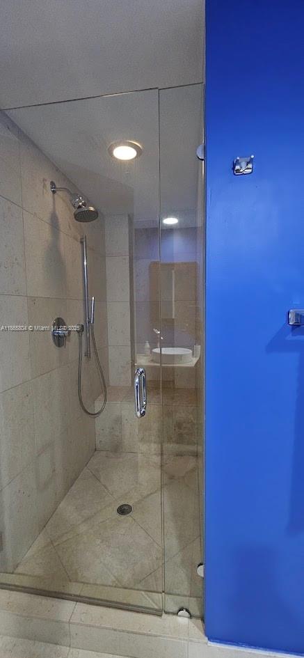 495 Brickell Avenue, Unit 3308 Miami, FL 33131 - Photo 9 of 15 a bathroom with a shower