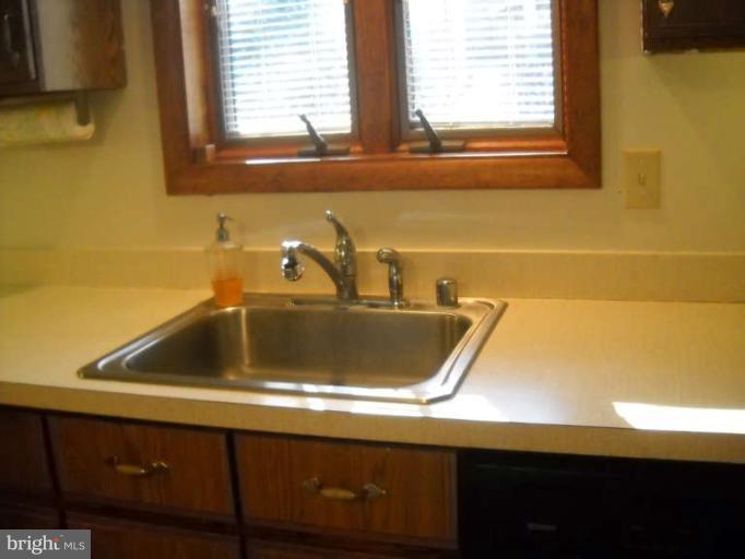 106 Birch Run Road Chestertown, MD 21620 - Photo 15 of 25 a view of a sink a window and a kitchen