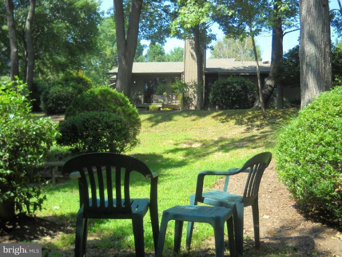 106 Birch Run Road Chestertown, MD 21620 - Photo 5 of 25 a view of an chairs and table in the patio