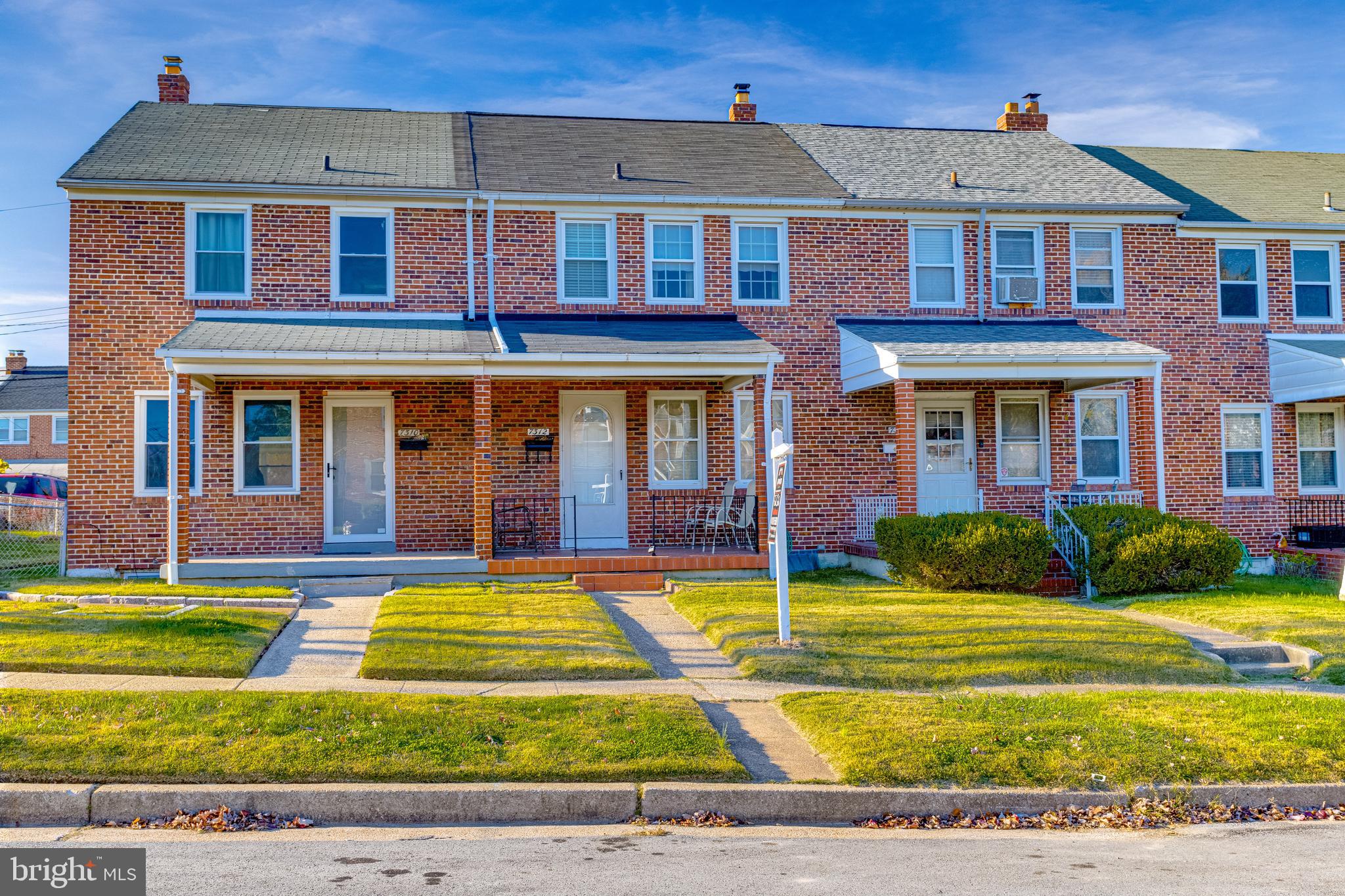 7312 Stratton Way Baltimore, MD 21224 - Photo 1 of 56 Brick Townhome with Covered Front Porch