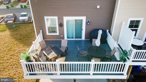 a view of balcony with furniture