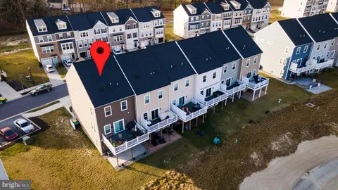 a view of a street with a building in the background