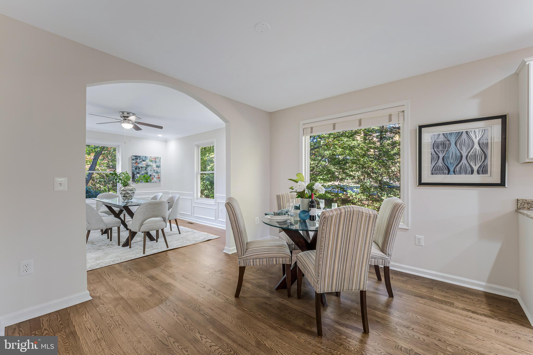 13430 Hidden Meadow Court Herndon, VA 20171 - Photo 20 of 54 a view of a dining room with furniture window and wooden floor