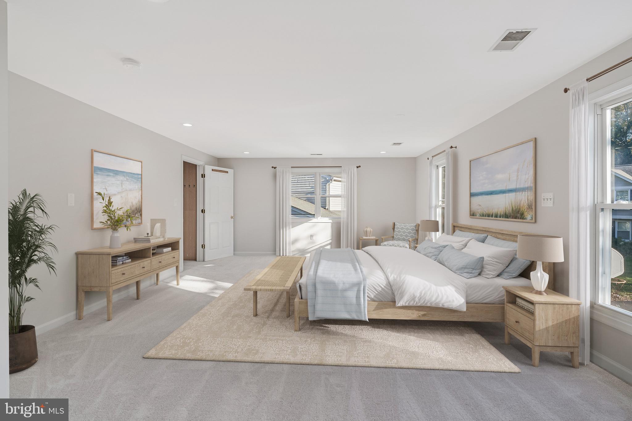 13430 Hidden Meadow Court Herndon, VA 20171 - Photo 29 of 54 a bedroom with a bed and a couch