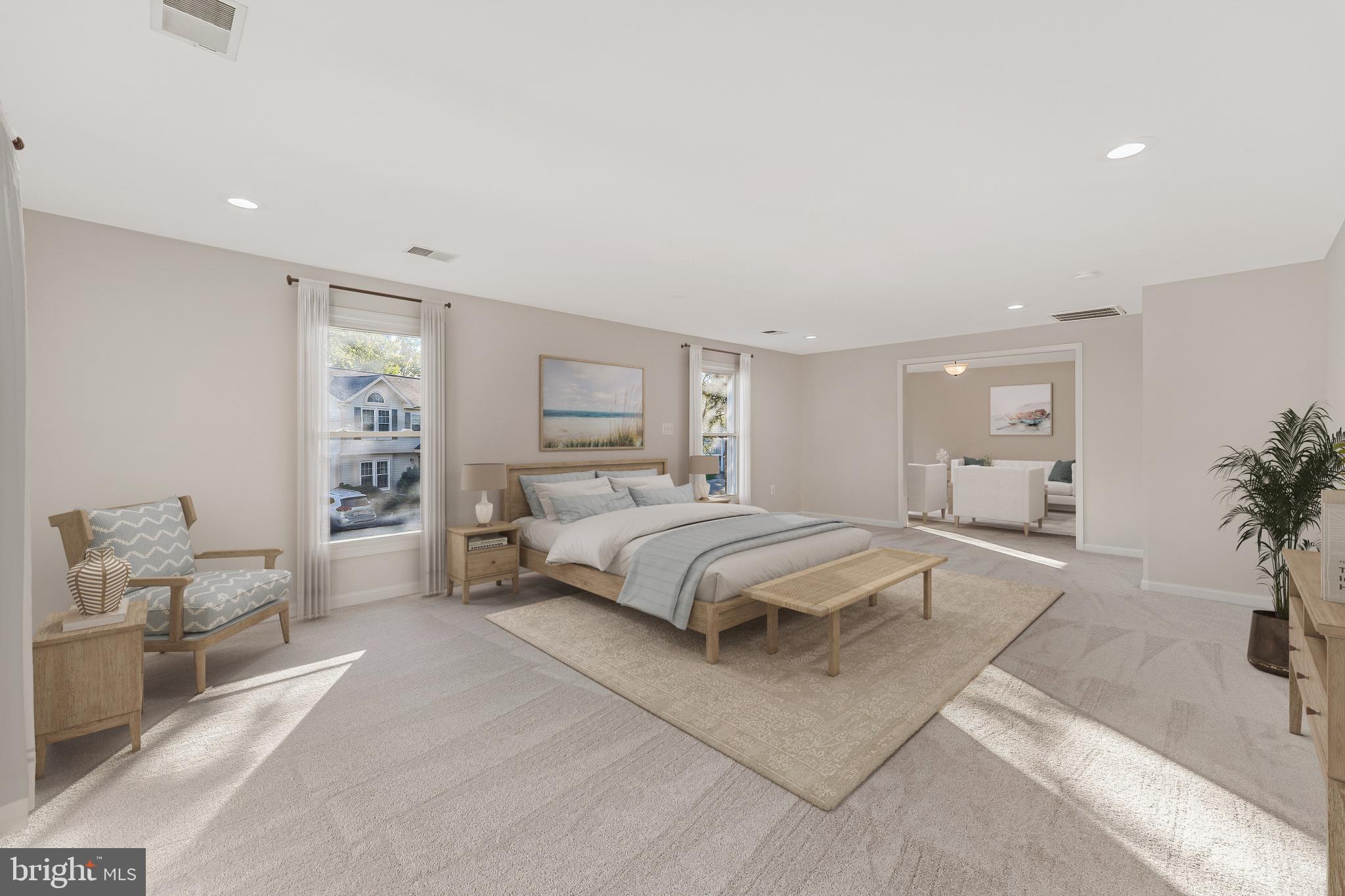 13430 Hidden Meadow Court Herndon, VA 20171 - Photo 30 of 54 a bedroom with a large bed and a couch