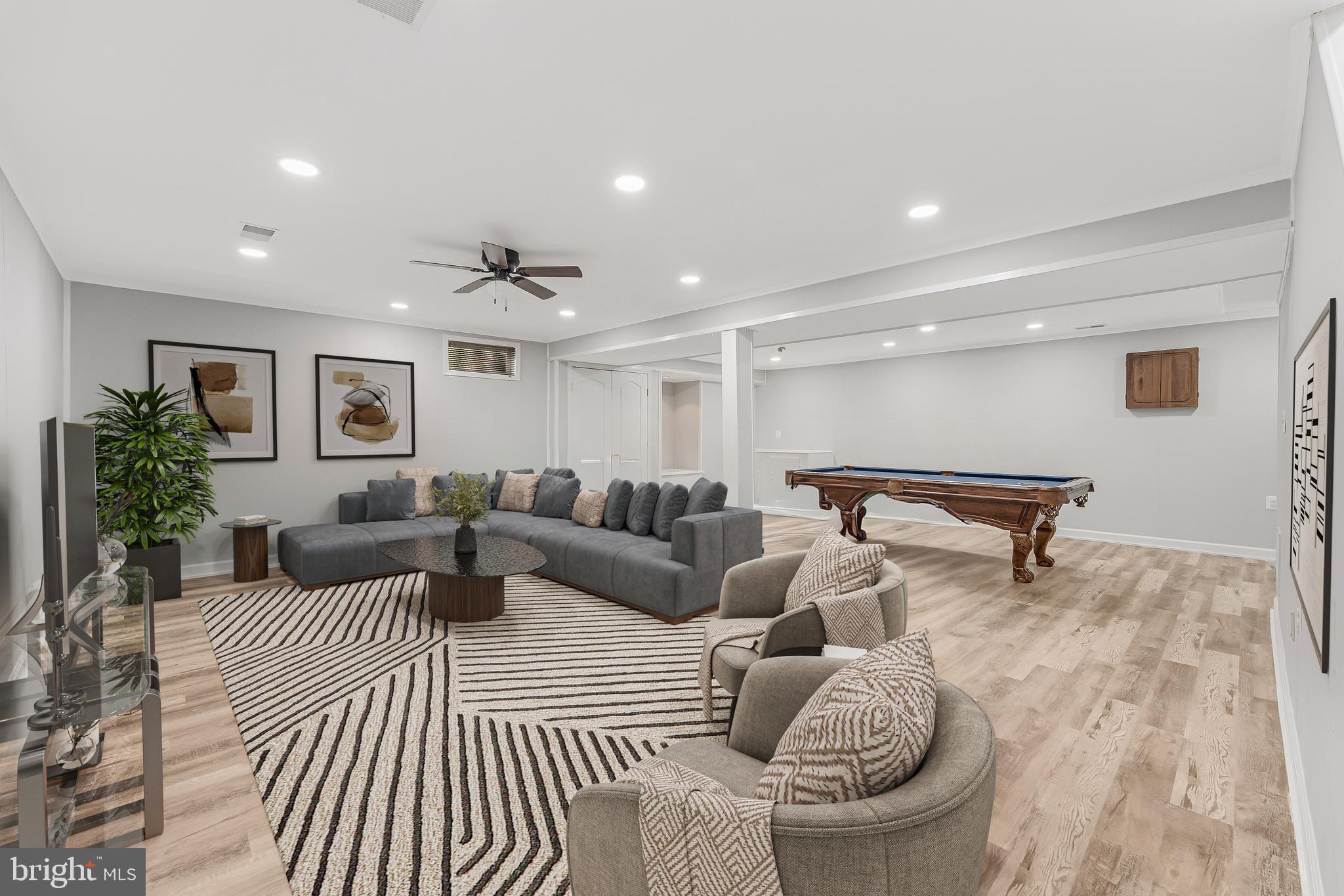 13430 Hidden Meadow Court Herndon, VA 20171 - Photo 44 of 54 a living room with furniture and a rug