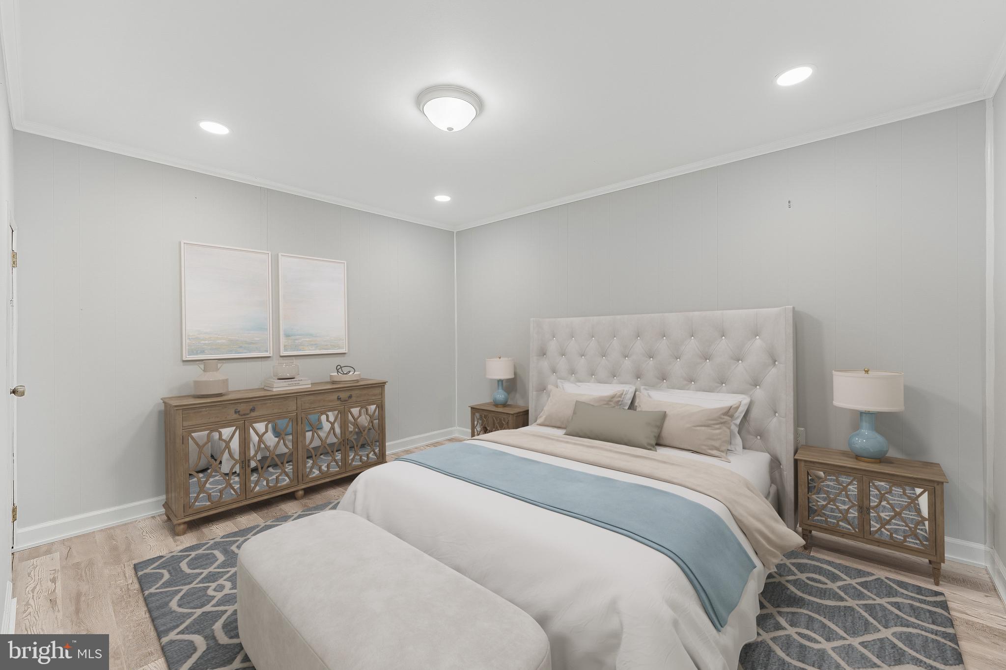 13430 Hidden Meadow Court Herndon, VA 20171 - Photo 46 of 54 a bedroom with a large bed and a couch