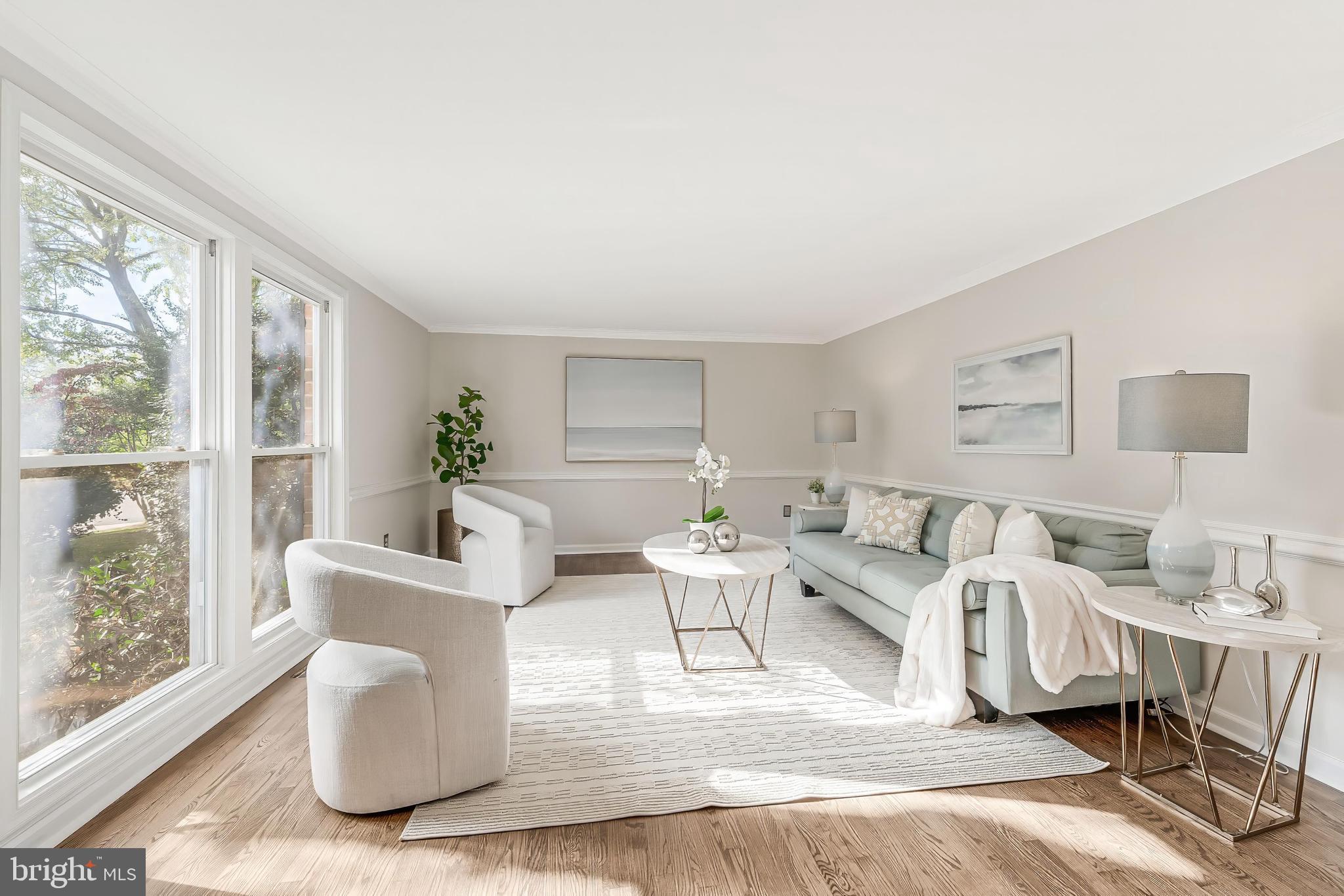 13430 Hidden Meadow Court Herndon, VA 20171 - Photo 6 of 54 a living room with furniture and a large window