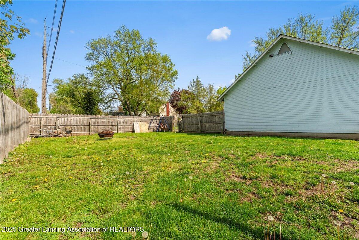 900 Dunlap Street Lansing, MI 48910 - Photo 25 of 30 Back yard/back of garage