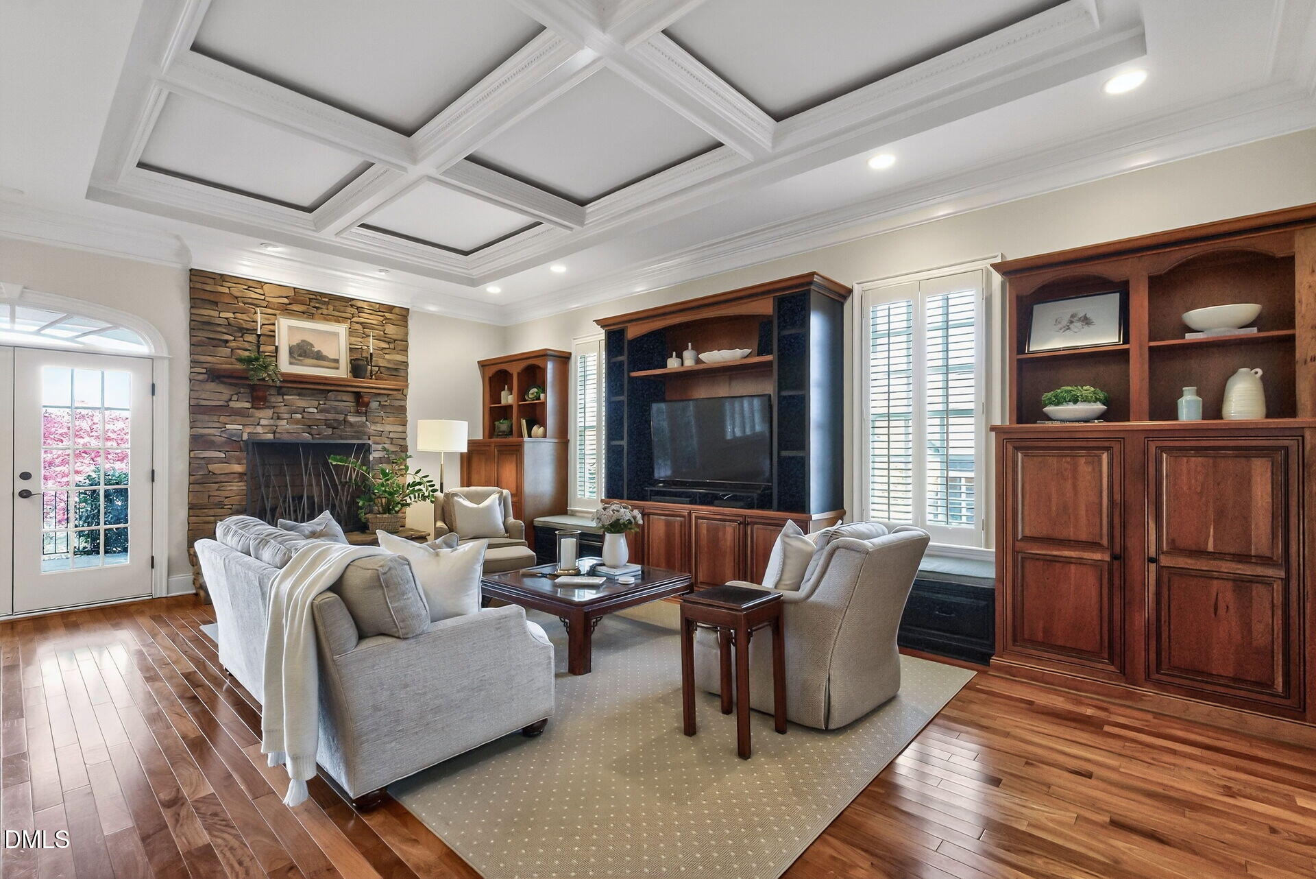 4119 English Garden Way Raleigh, NC 27612 - Photo 11 of 48 a living room with furniture fireplace and wooden floor
