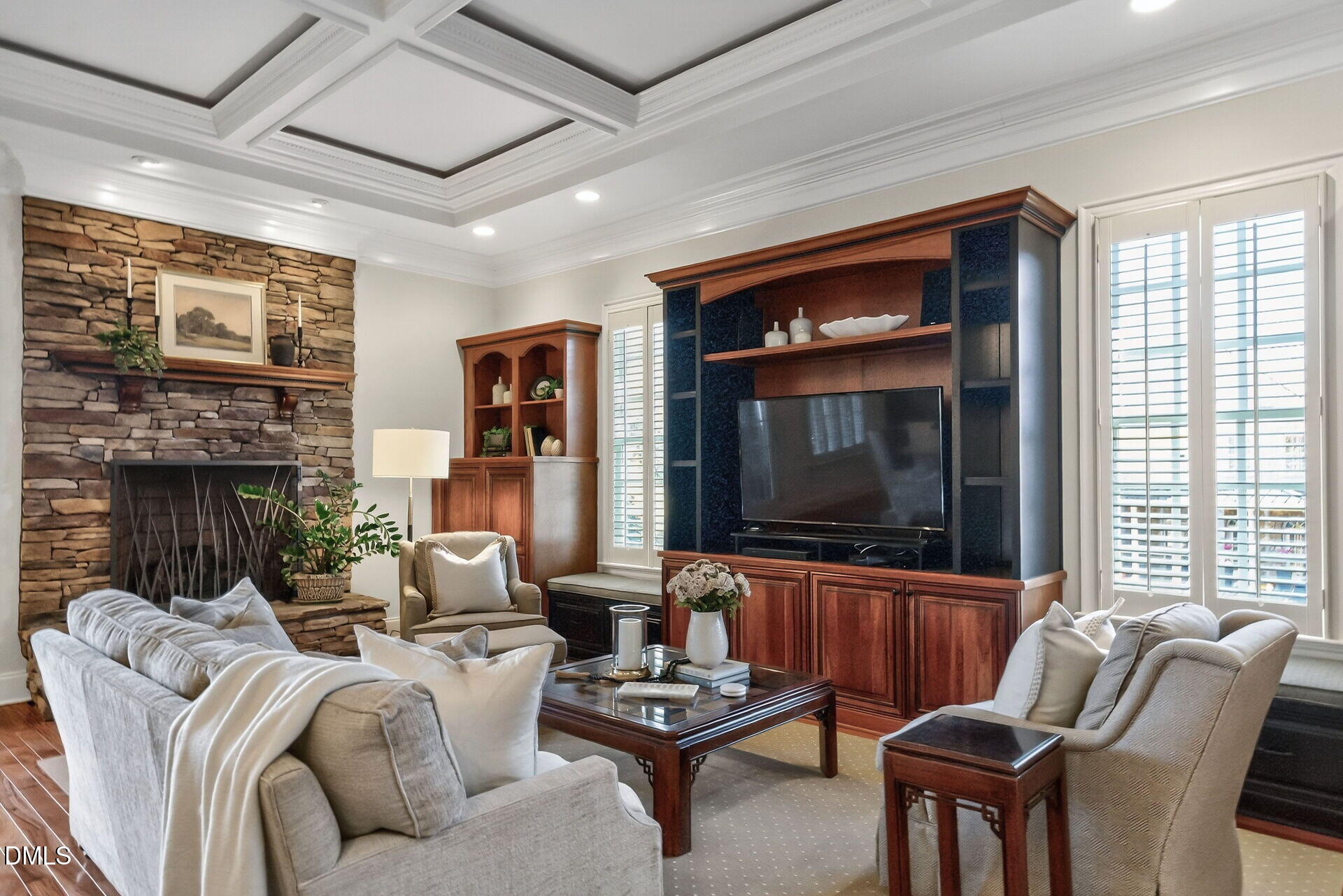 4119 English Garden Way Raleigh, NC 27612 - Photo 12 of 48 a living room with furniture and a flat screen tv