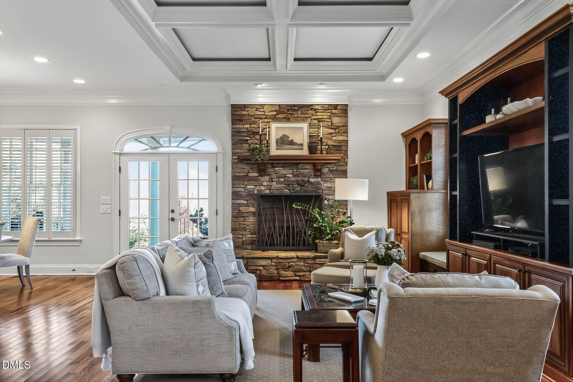 4119 English Garden Way Raleigh, NC 27612 - Photo 13 of 48 a living room with fireplace furniture and a flat screen tv