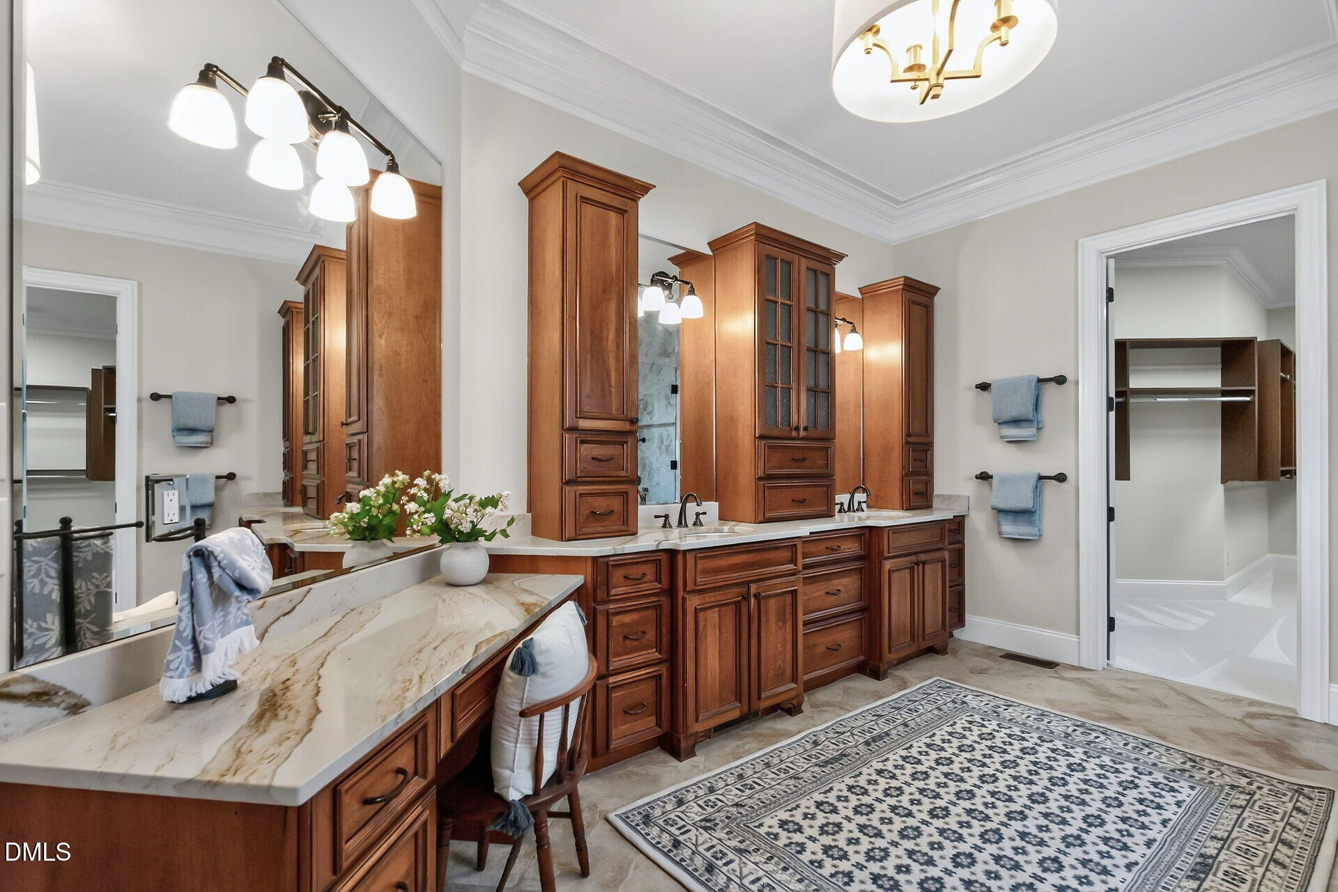 4119 English Garden Way Raleigh, NC 27612 - Photo 27 of 48 a large bathroom with a granite countertop sink a toilet a mirror and vanity