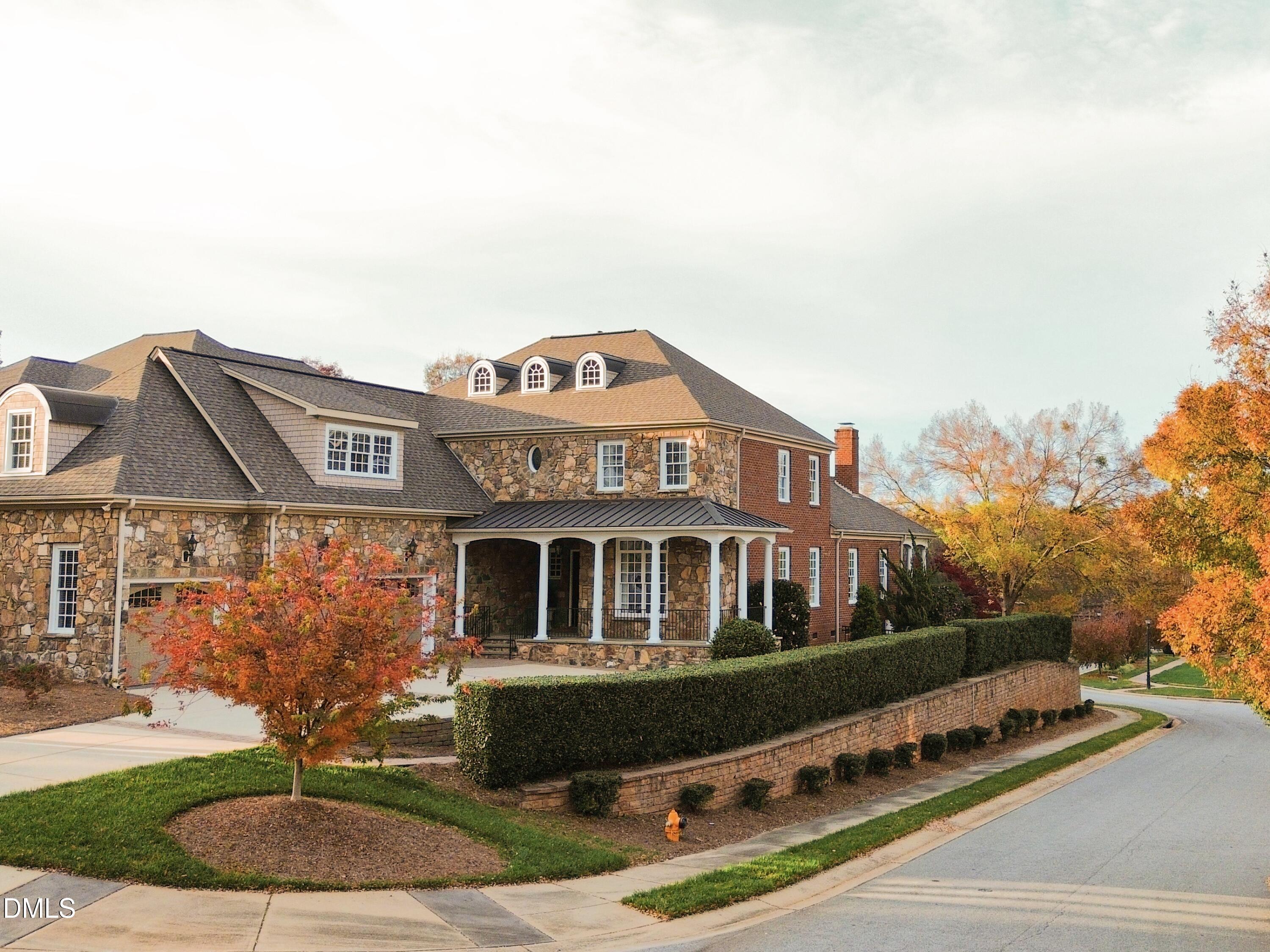 4119 English Garden Way Raleigh, NC 27612 - Photo 4 of 48 a front view of a house with garden