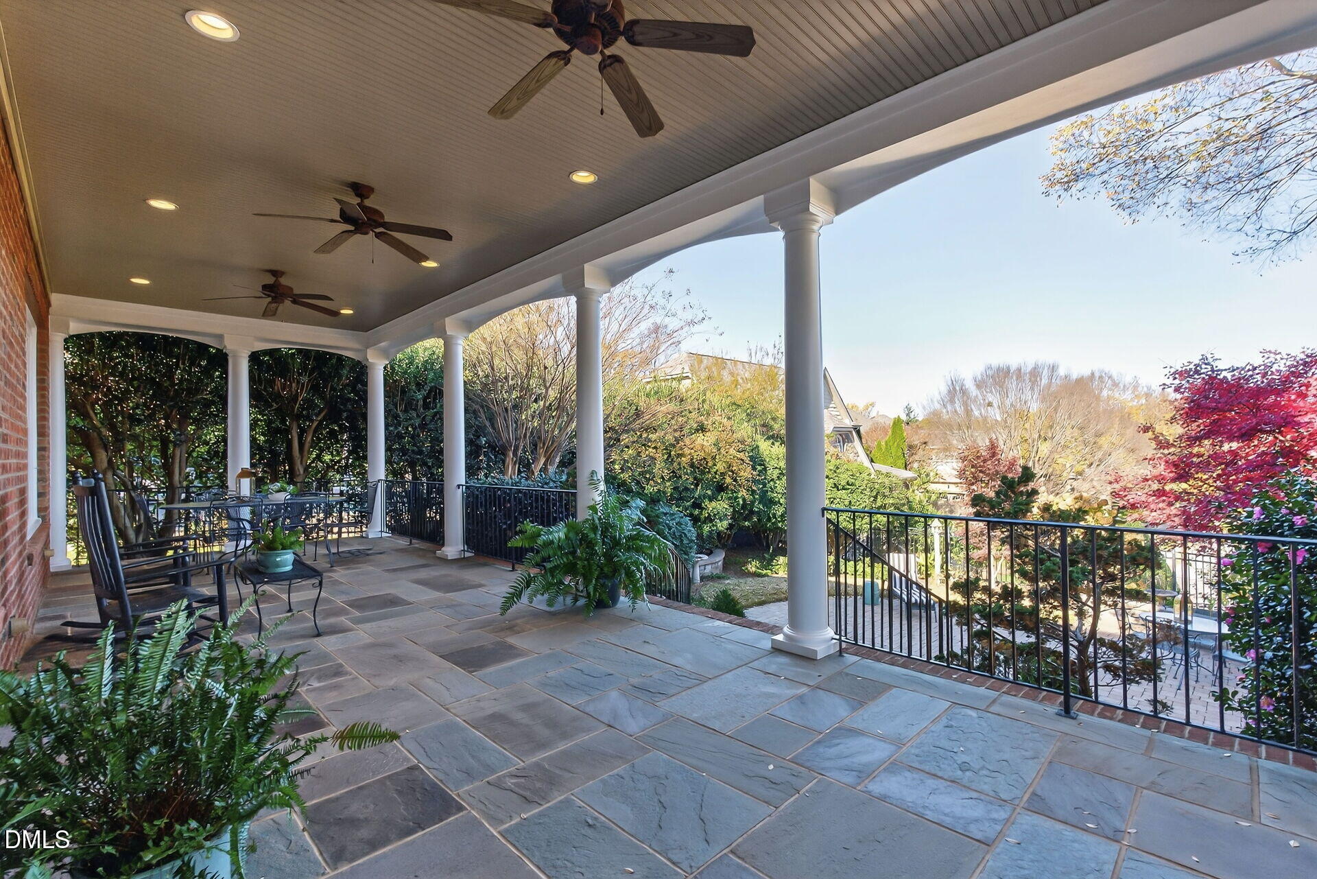 4119 English Garden Way Raleigh, NC 27612 - Photo 43 of 48 a building outdoor space with patio furniture and potted plants