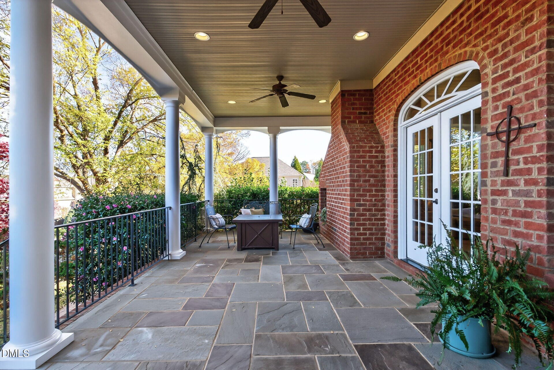 4119 English Garden Way Raleigh, NC 27612 - Photo 44 of 48 a view of a porch with plants and wooden floor