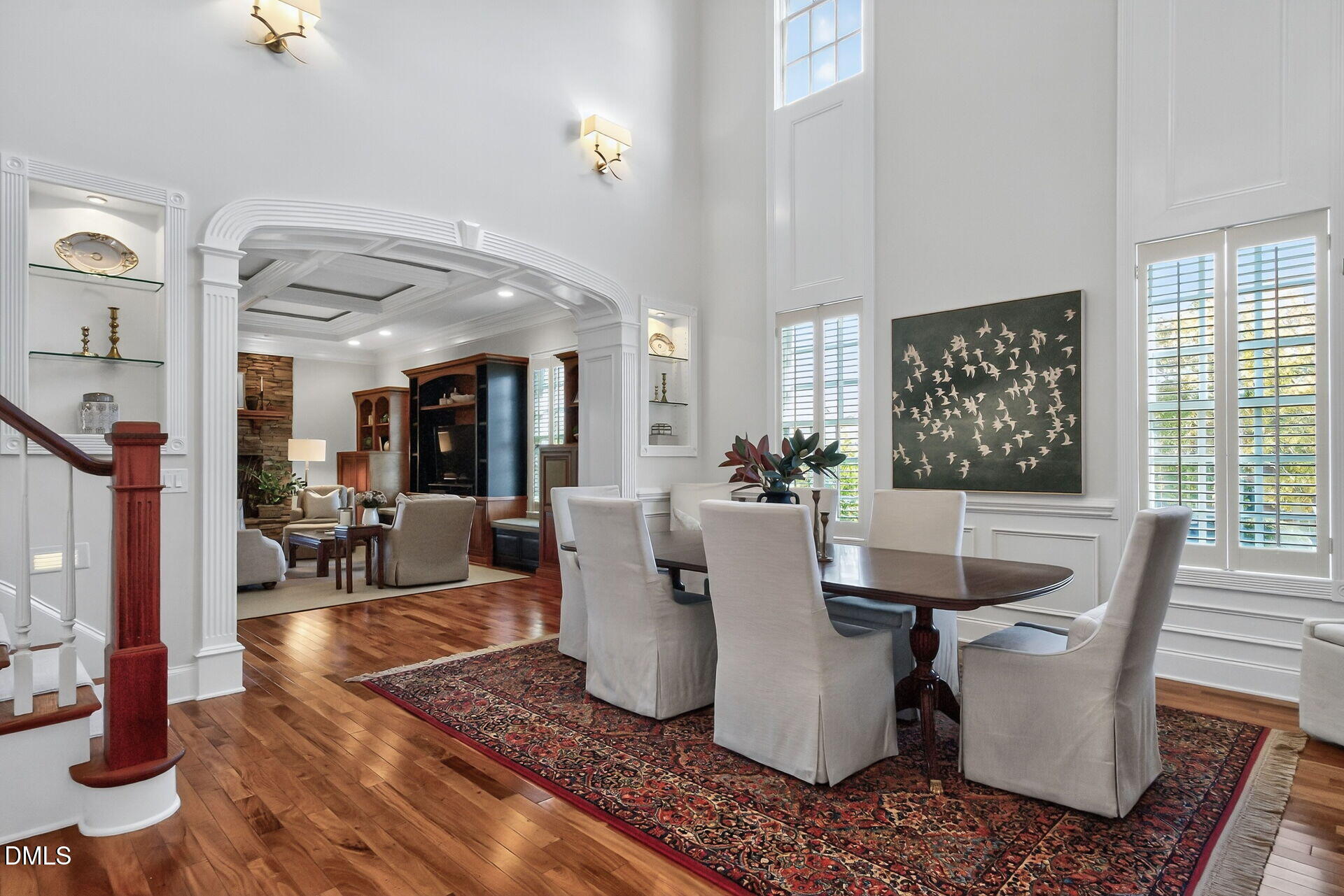 4119 English Garden Way Raleigh, NC 27612 - Photo 7 of 48 a dining room with wooden floor and large windows