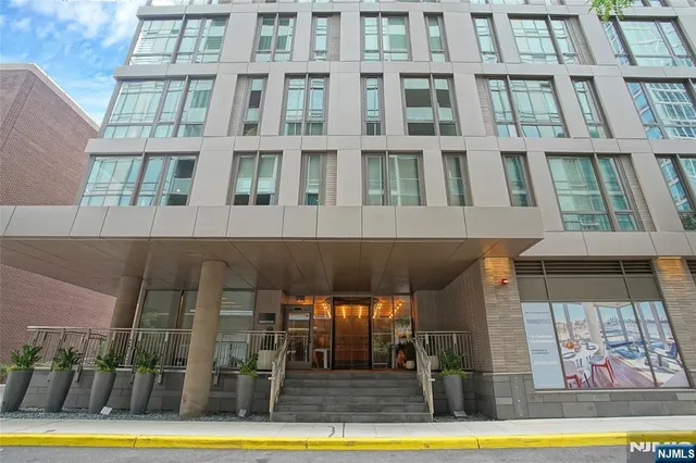 a view of a building with a swimming pool