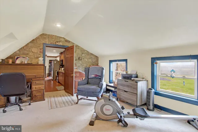 a bathroom with a sink a mirror and a toilet