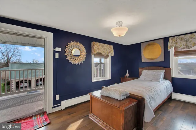 a bedroom with a bed and a walk in closet