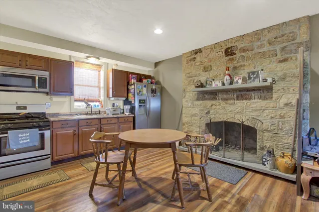 an aerial view of a house having outdoor space and swimming pool
