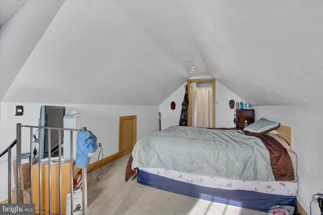 a view of a backyard with sitting area