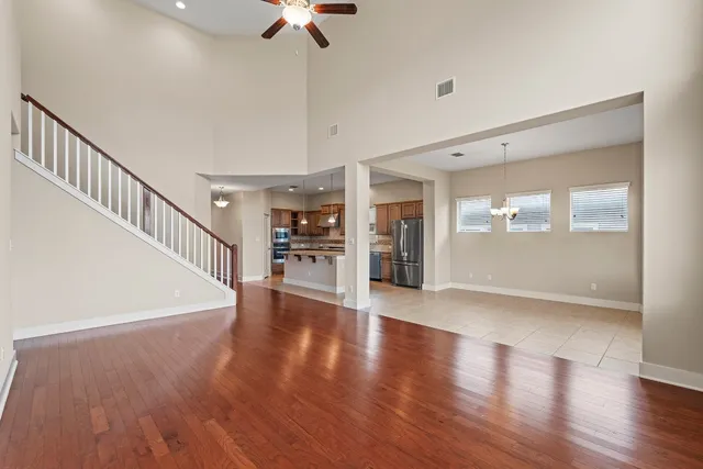 a view of an entryway with wooden floor