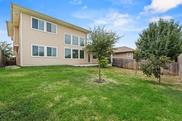 a house view with a garden space