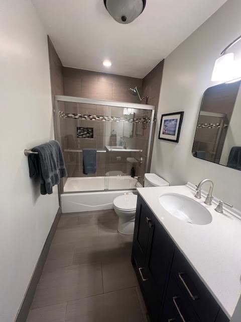 42 R Olney Street, Unit 2 Boston, MA 02121 - Photo 14 of 17 a bathroom with a toilet sink and mirror
