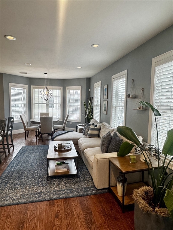42 R Olney Street, Unit 2 Boston, MA 02121 - Photo 2 of 17 a living room with furniture rug and window