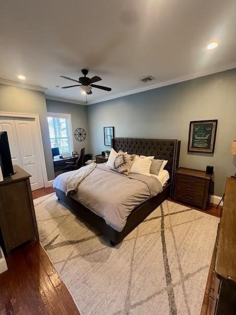 42 R Olney Street, Unit 2 Boston, MA 02121 - Photo 7 of 17 a bedroom with a bed and a chandelier