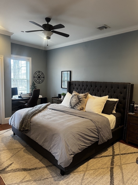 42 R Olney Street, Unit 2 Boston, MA 02121 - Photo 8 of 17 a bedroom with a bed and window