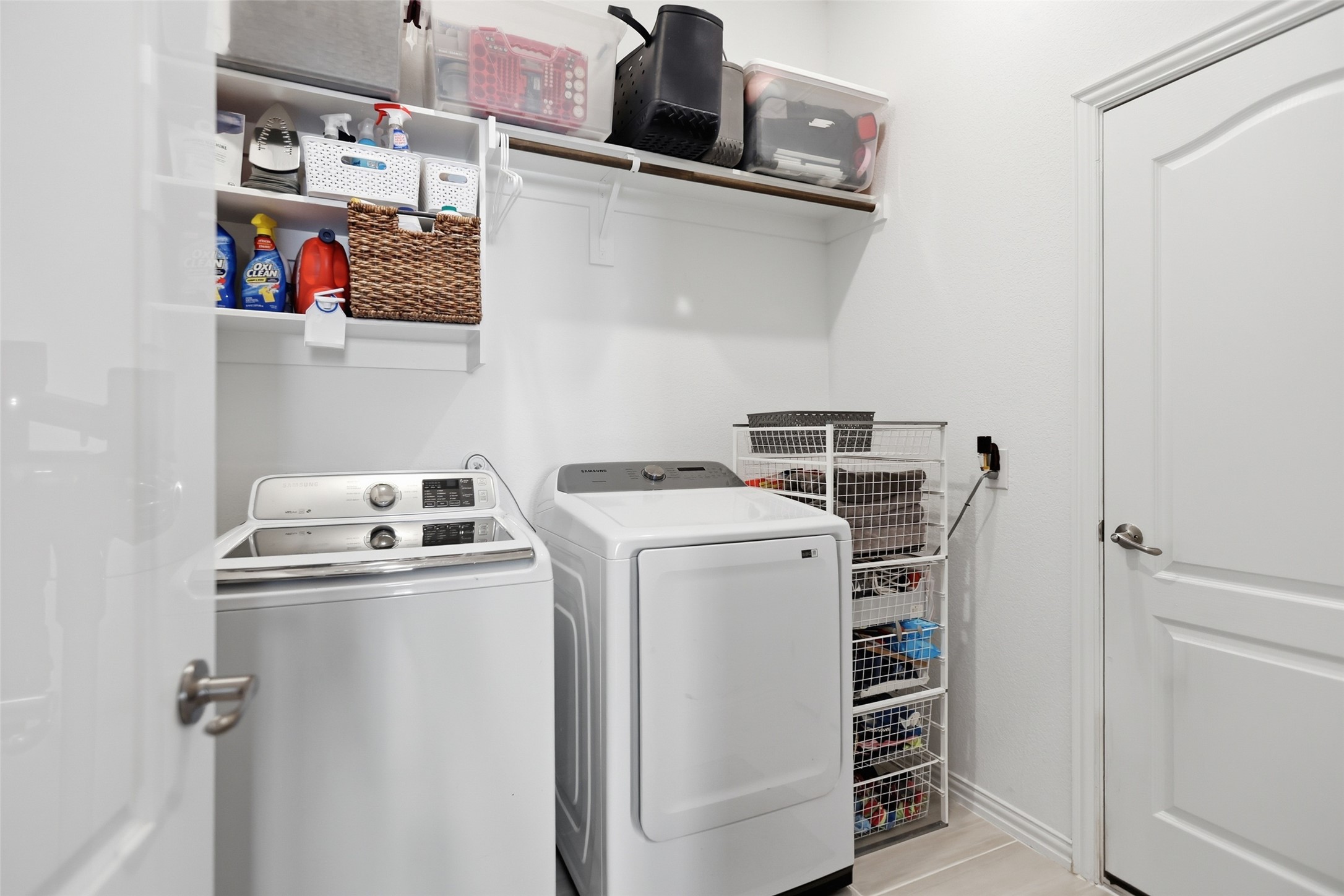 544 Cherrystone Loop Buda, TX 78610 - Photo 27 of 40 a view of storage and utility room with washer and dryer
