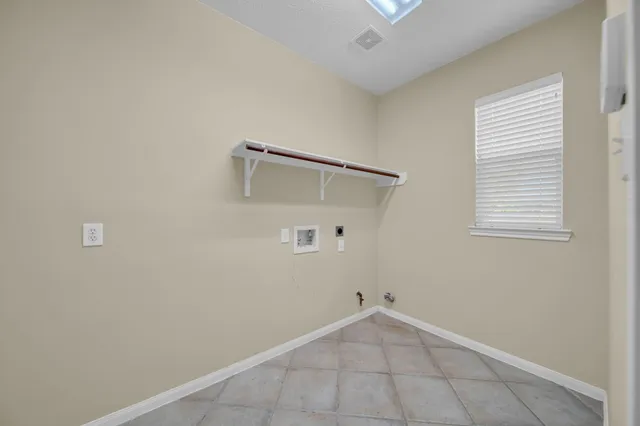 a very nice looking room with wooden floor