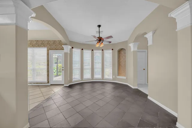 a living room with fireplace furniture and a flat screen tv