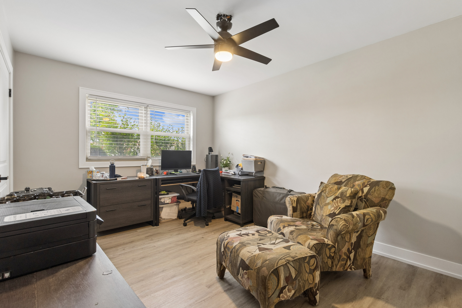 7911 West Rascher Avenue Chicago, IL 60656 - Photo 21 of 39 a living room with furniture and a large window