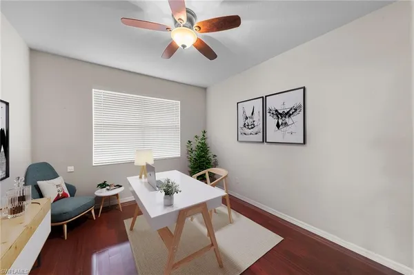 a workspace with furniture and window