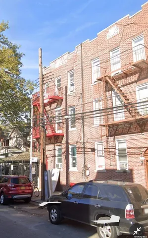 a car parked in front of a building