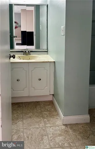 an empty room with a hallway