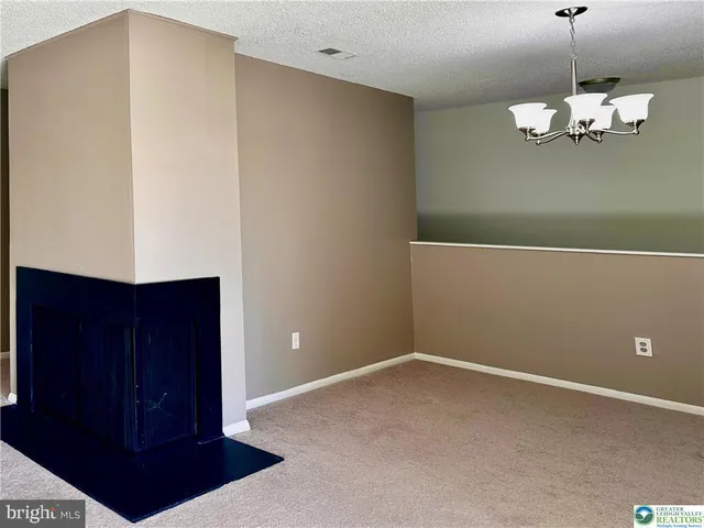 a kitchen with a stove and a sink