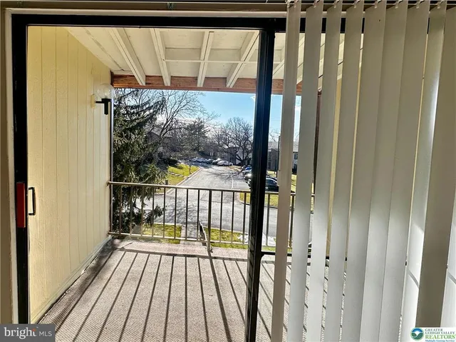 a bathroom with a shower and a bath tub