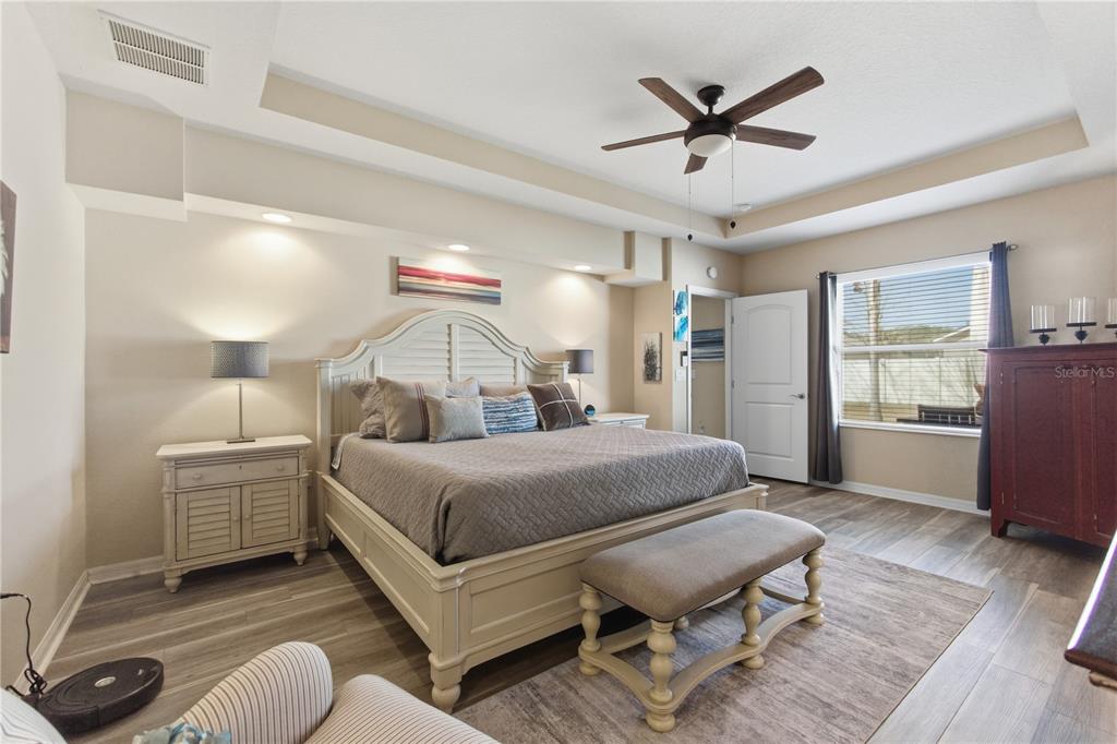 48 Evans Drive Palm Coast, FL 32164 - Photo 19 of 47 a bedroom with a bed and window