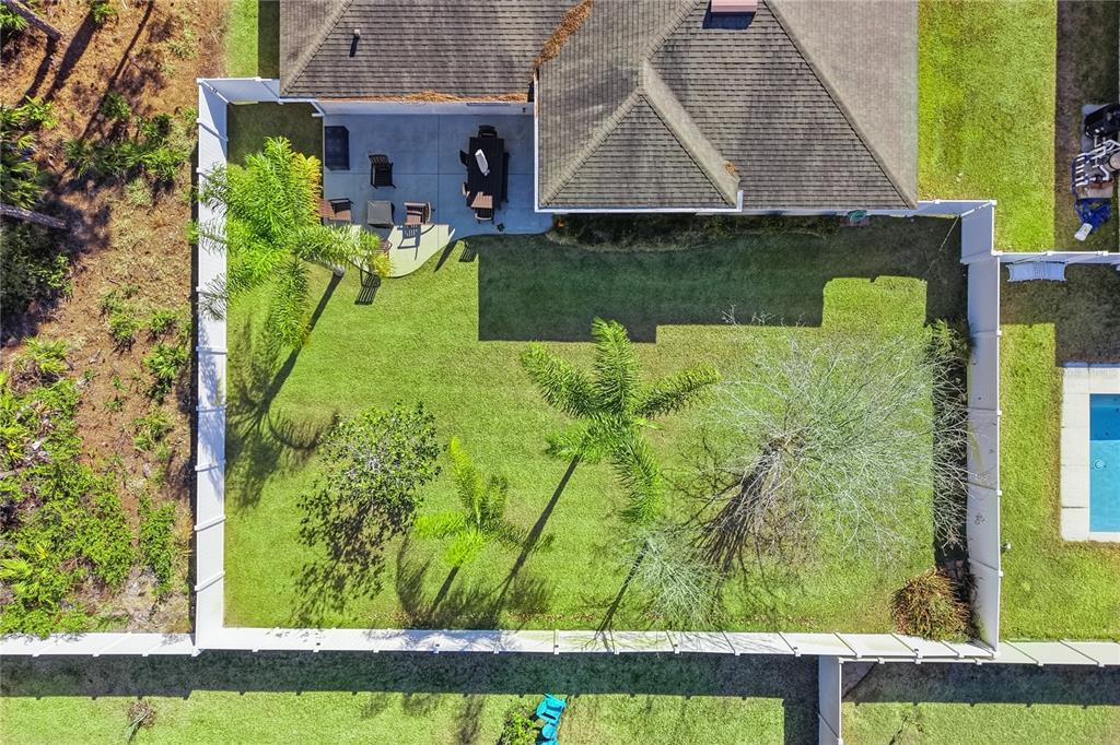 48 Evans Drive Palm Coast, FL 32164 - Photo 39 of 47 an aerial view of a house with a yard