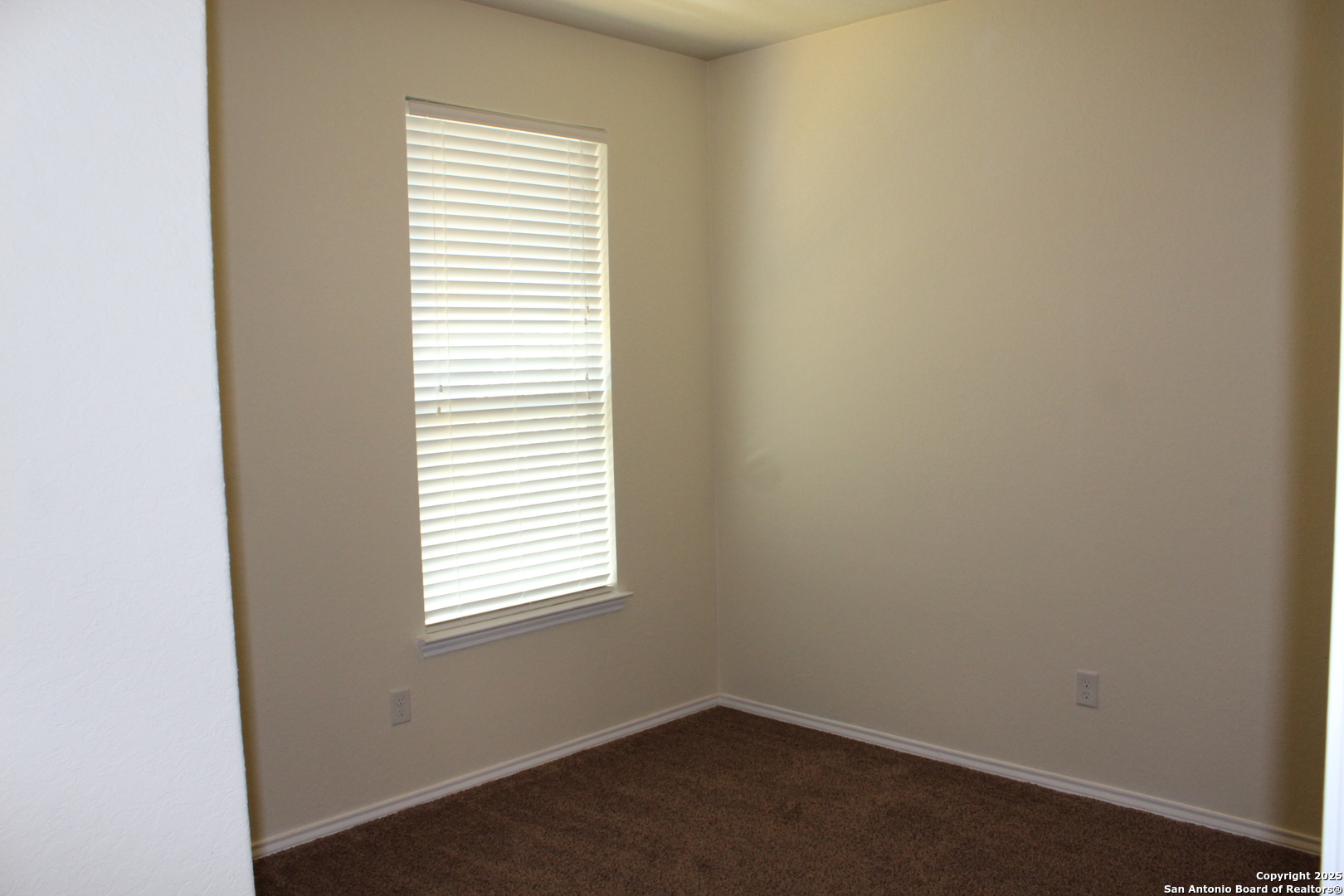 482 Walnut Crest Selma, TX 78154 - Photo 11 of 19 an empty room with a window